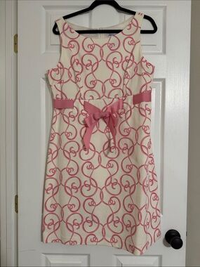 Jessica Howard Cream Dress with Pink Swirl Design and Bow